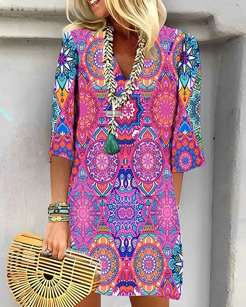 GR | Dress with geometric print and 3/4 sleeves