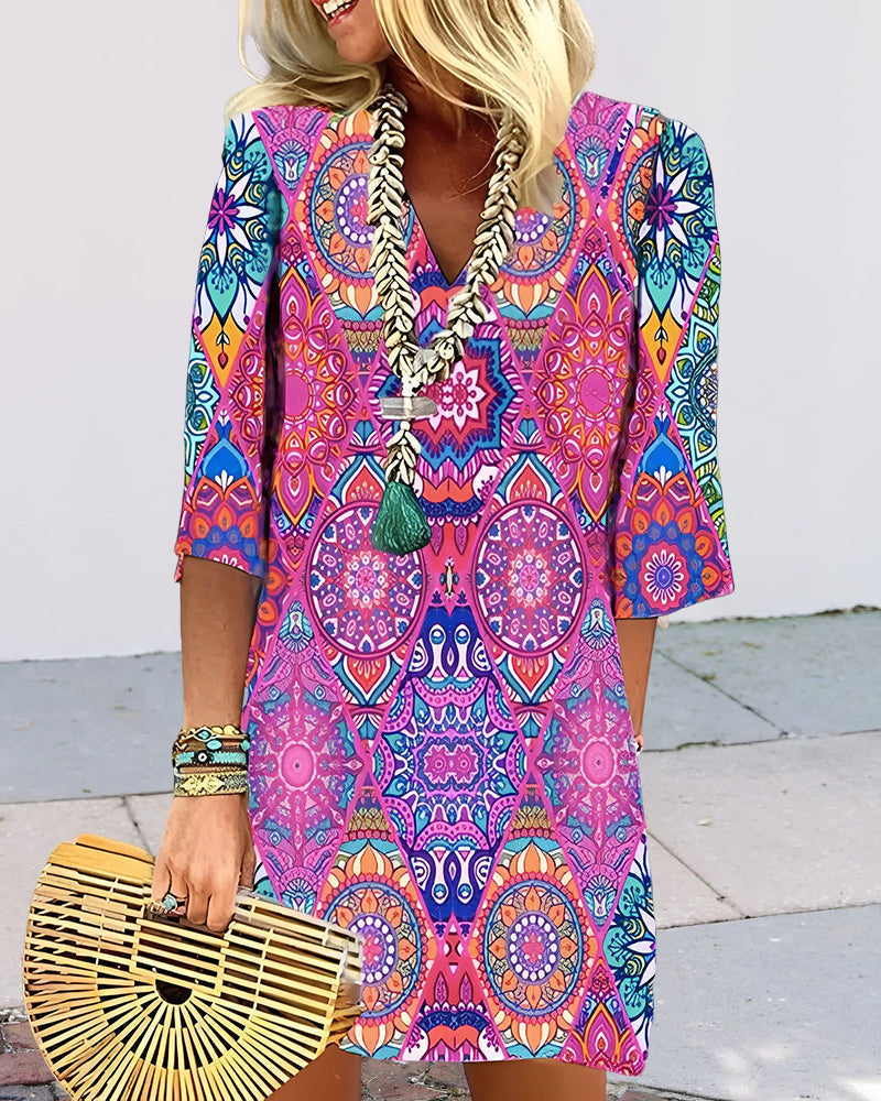 GR | Dress with geometric print and 3/4 sleeves