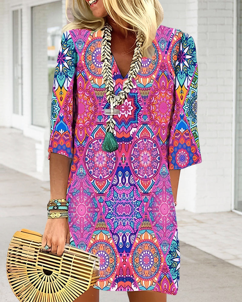 GR | Dress with geometric print and 3/4 sleeves