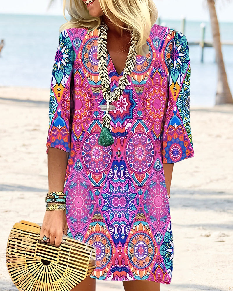 GR | Dress with geometric print and 3/4 sleeves