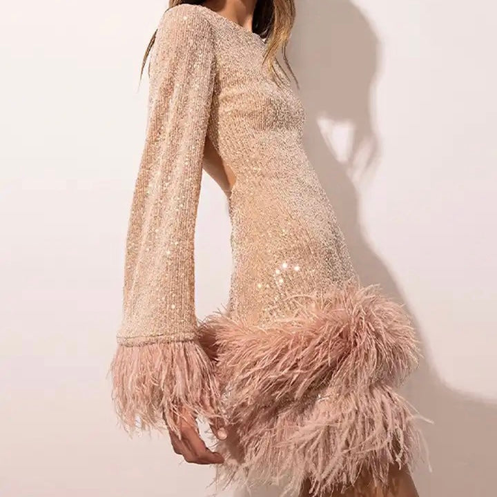 GR | Glamorous sequined dress with feather hem detail