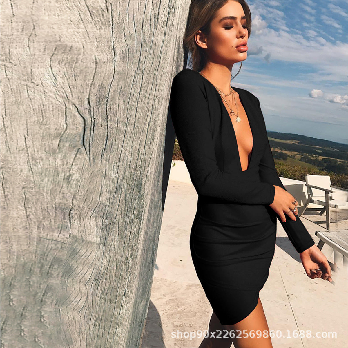 Women's figure-hugging dress with deep V-neck and long sleeves, size