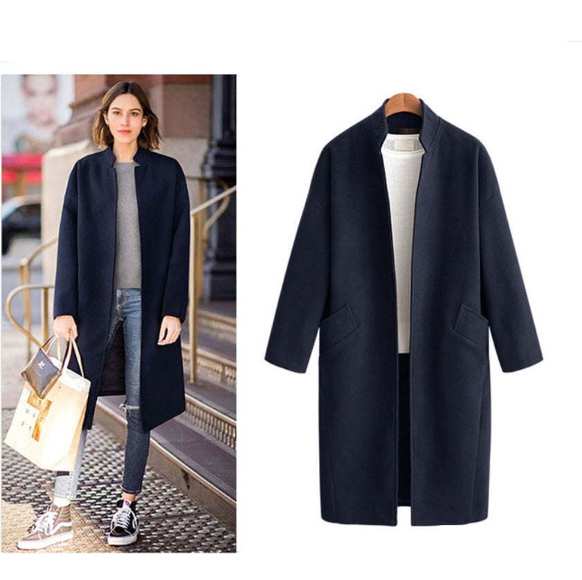 Women's elegant long jacket with a casual collar and practical pockets, size
