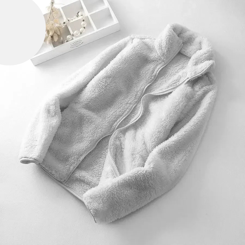 and a fluffy jacket with a zipper, fleece vest