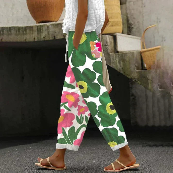 GR | Green trousers with fresh floral print