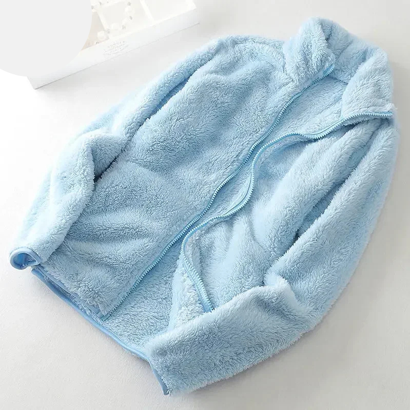 and a fluffy jacket with a zipper, fleece vest