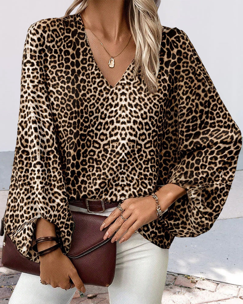 GR | Stylish leopard print top with V-neck and lantern sleeves