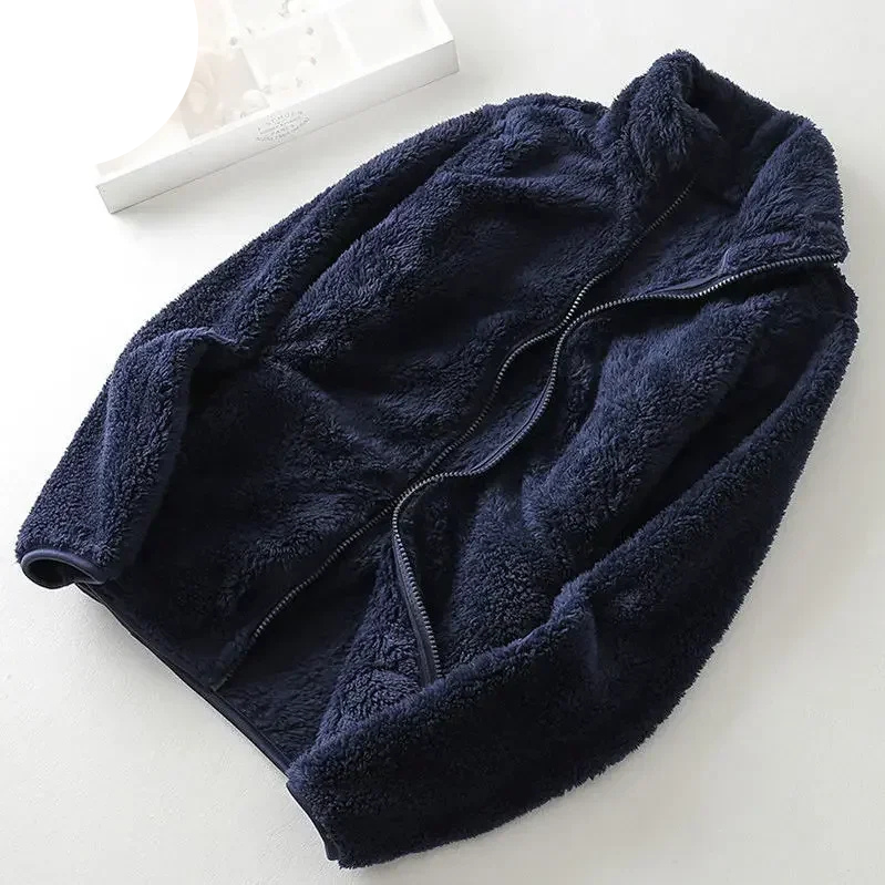 and a fluffy jacket with a zipper, fleece vest