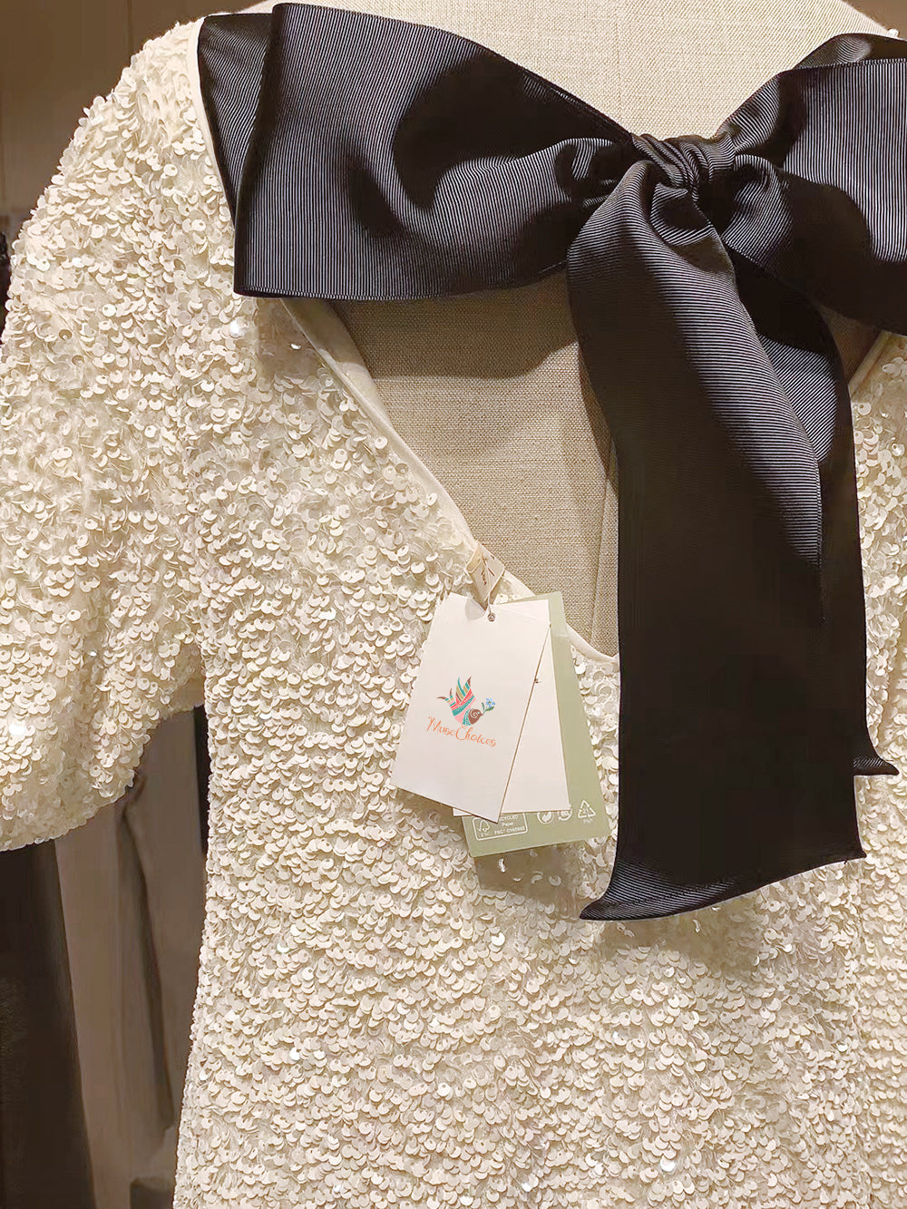 GR Dress | Elegant glitter dress with a bow closure at the back