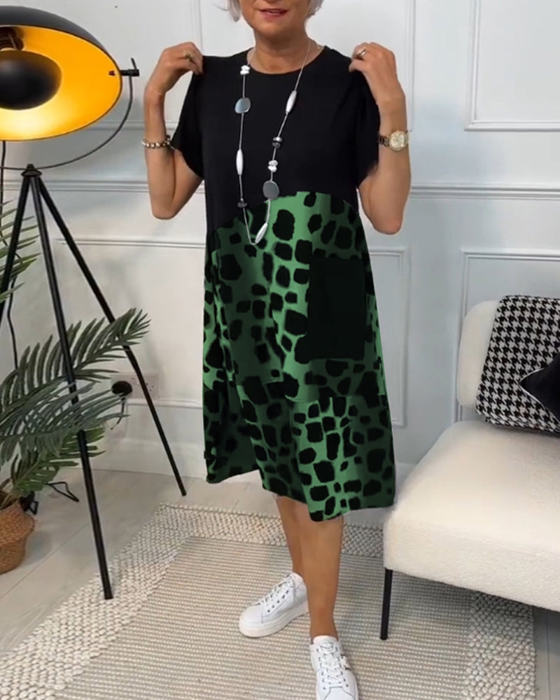 GR | Short-sleeved, printed dress with a round neckline