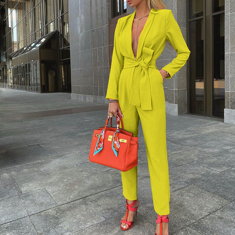 Women's jumpsuit with buttoned V-neck and tailored design, size