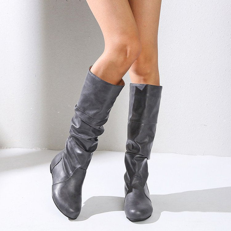 Women's elegant boots with a modern pleated design and comfortable block heel, size S