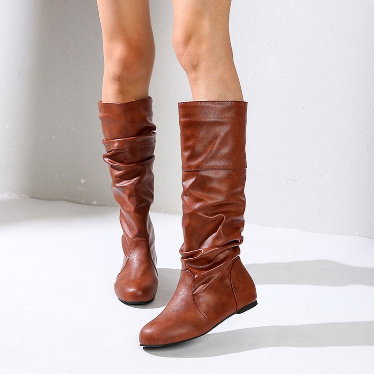 Women's elegant boots with a modern pleated design and comfortable block heel, size S