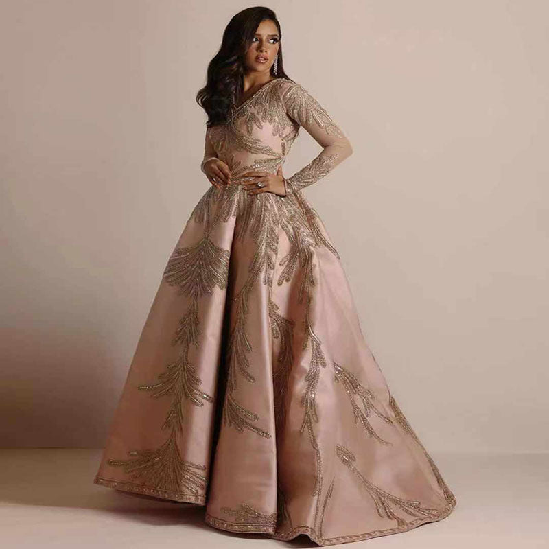 Women's glamorous ball gown with delicate sequin embellishment and long cut, size S