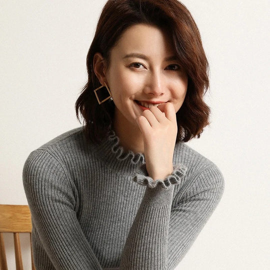 Knit sweater with high collar