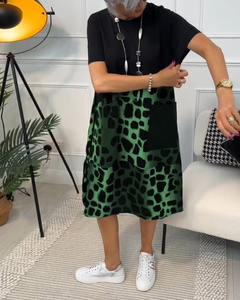 GR | Short-sleeved, printed dress with a round neckline
