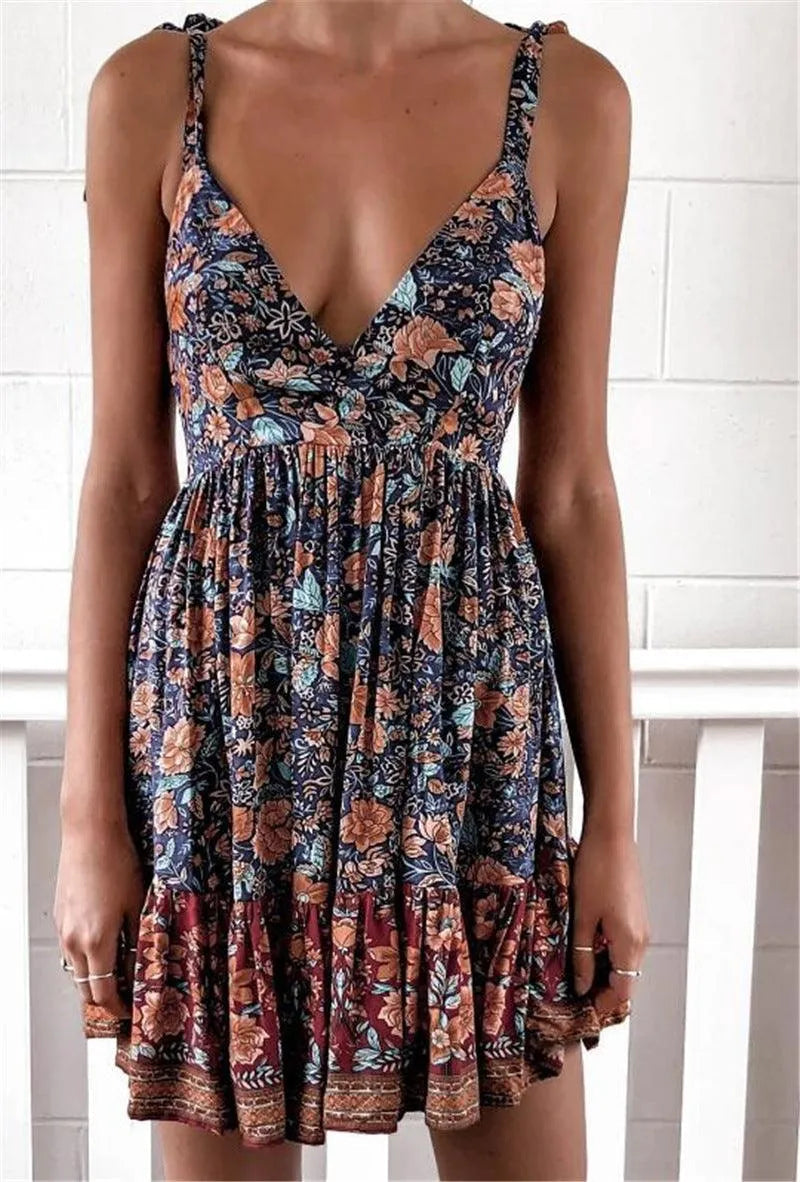 GR | Printed dress with a deep neckline and shoulder straps for women