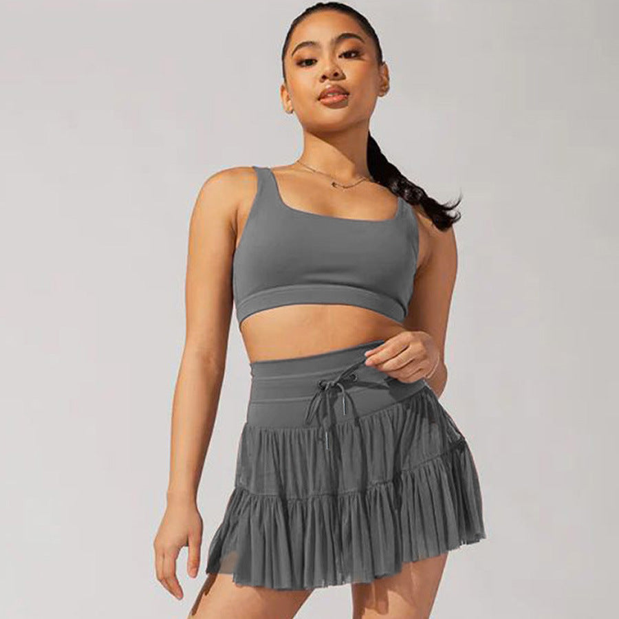 GR | High-waisted mini skirt with safety shorts
