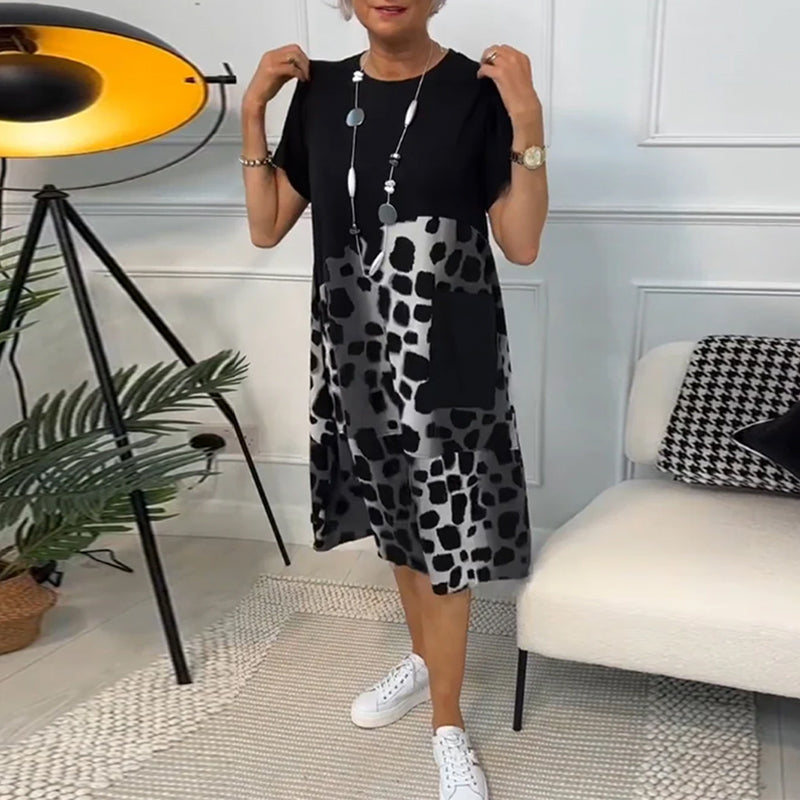 GR | Short-sleeved, printed dress with a round neckline