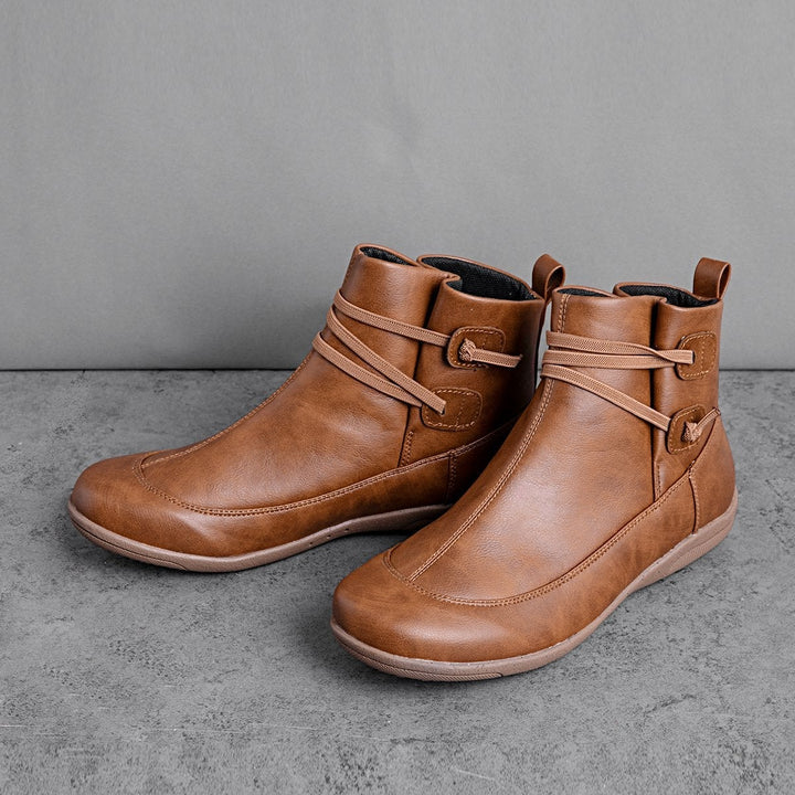 Ankle boots with straps