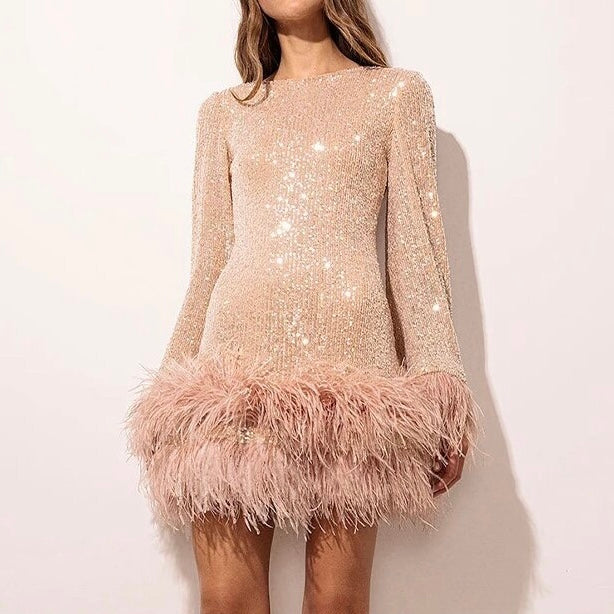 GR | Glamorous sequined dress with feather hem detail