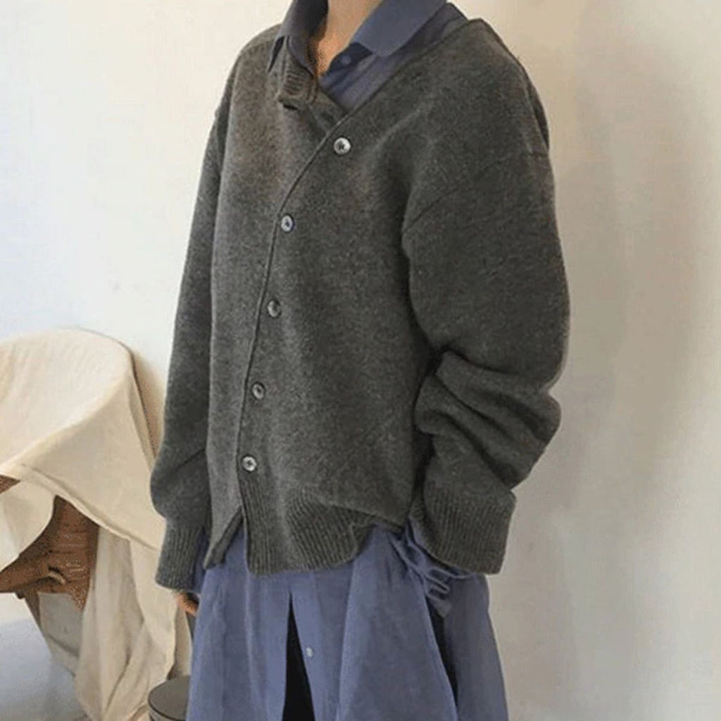 Jacket made of cuddly material with a playful button placket 
