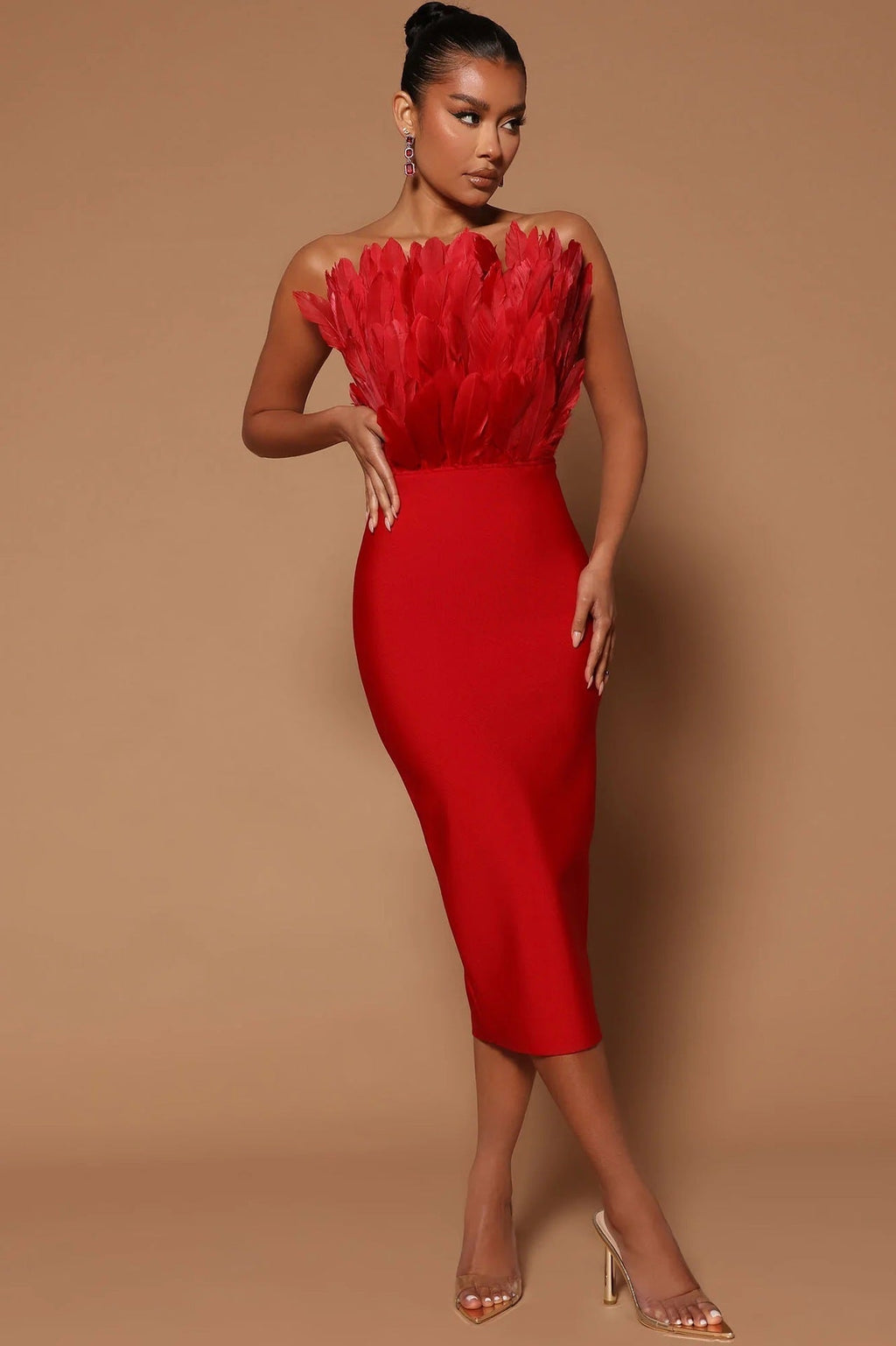 GR women's dress with waist accentuation and feather embellishment