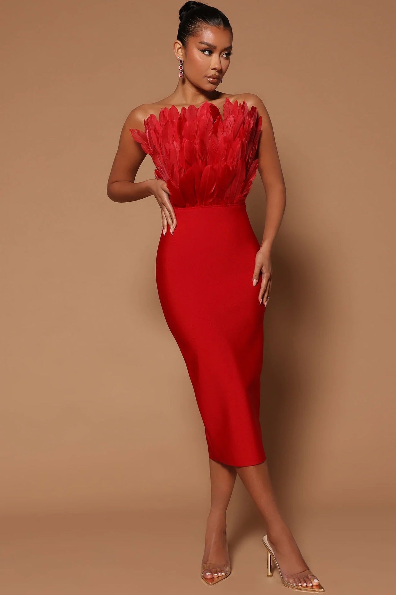 GR women's dress with waist accentuation and feather embellishment