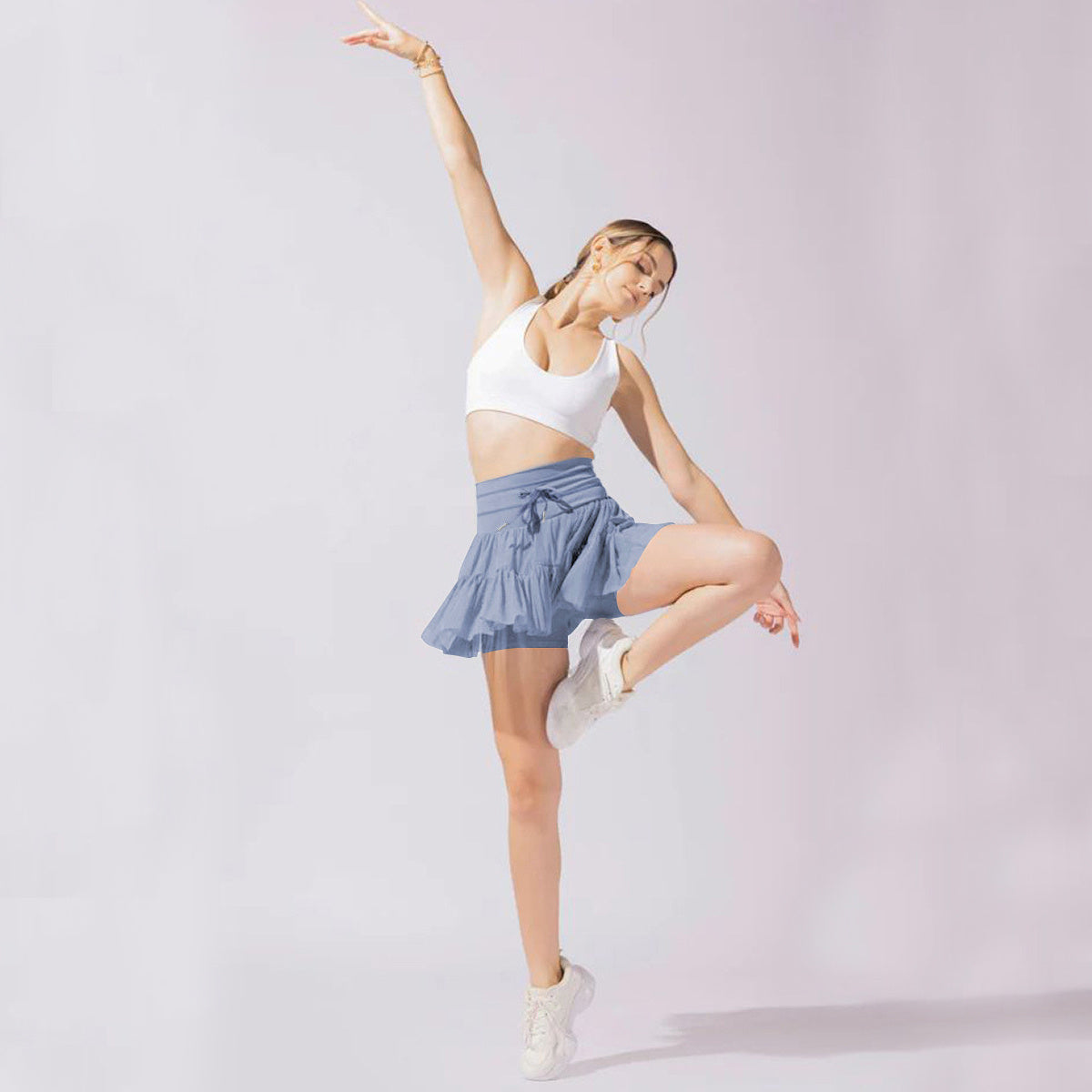 GR | High-waisted mini skirt with safety shorts