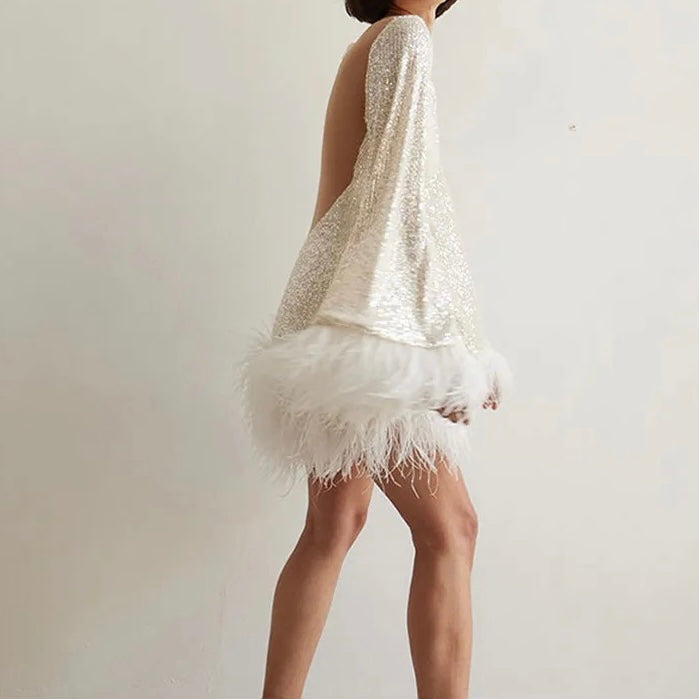GR | Glamorous sequined dress with feather hem detail