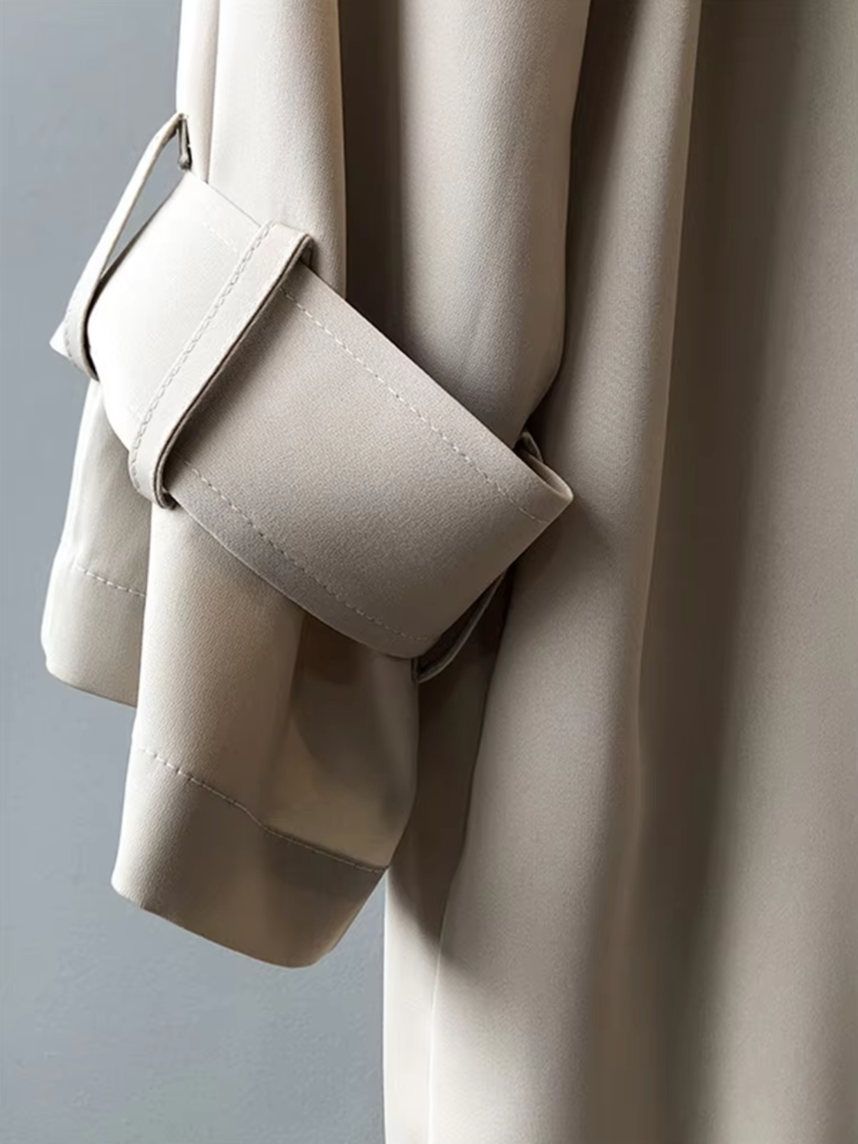 – Mid-length trench coat