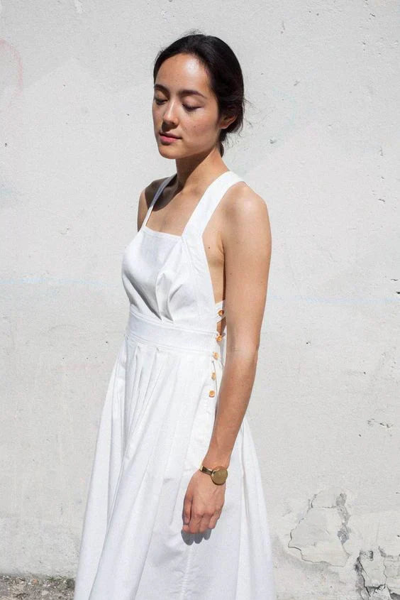 GR | Backless, pleated dress with large pockets