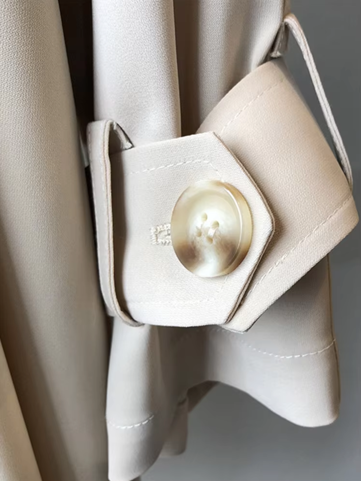 – Mid-length trench coat