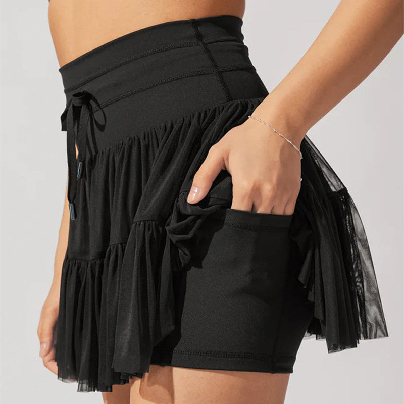 GR | High-waisted mini skirt with safety shorts