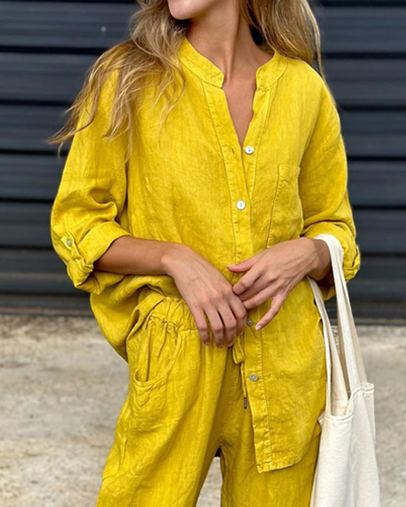 V-neck shirt and cotton trousers
