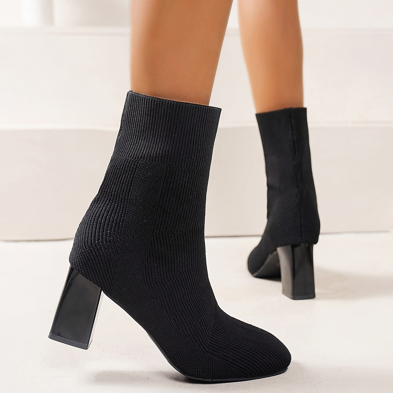 GR | Knitted boots with mid-height shaft and block heel