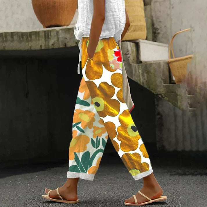 GR | Green trousers with fresh floral print