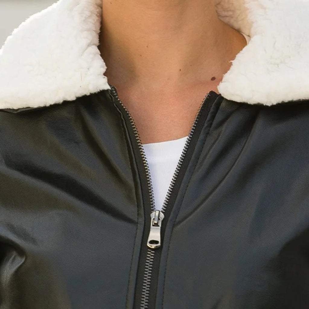 Winter chic: EMMA's leather jacket with fur collar