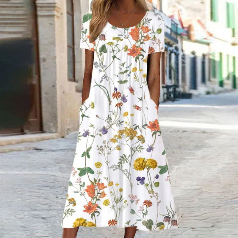 GR – Bohemian-style maxi dress with floral print and pockets | Short-sleeved floral maxi dress in boho-chic style for women