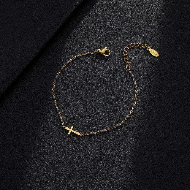 GR | Gold-tone cross bracelet
