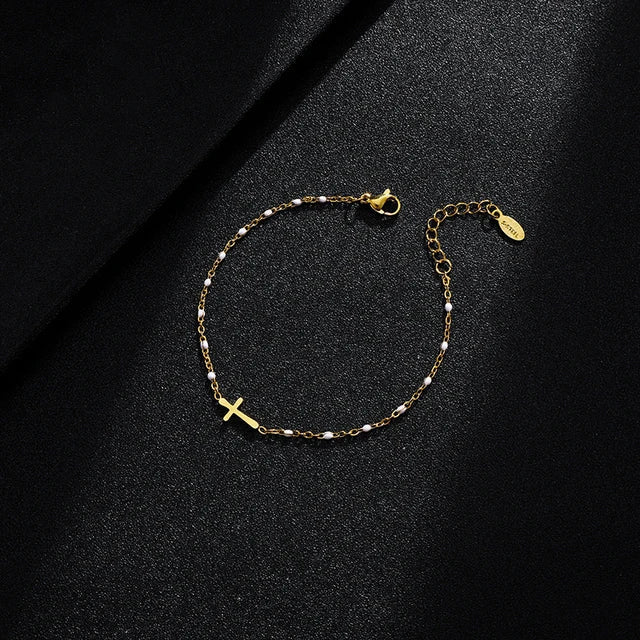 GR | Gold-tone cross bracelet