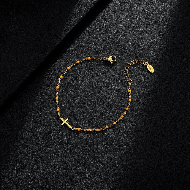 GR | Gold-tone cross bracelet
