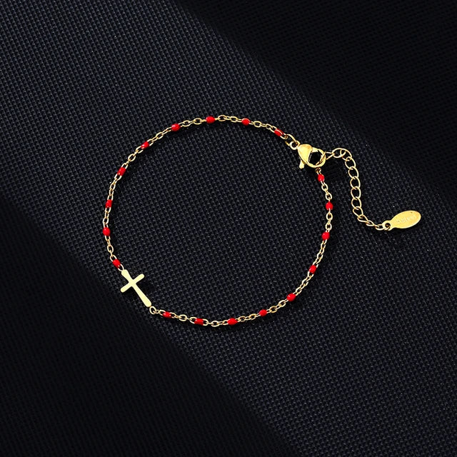 GR | Gold-tone cross bracelet