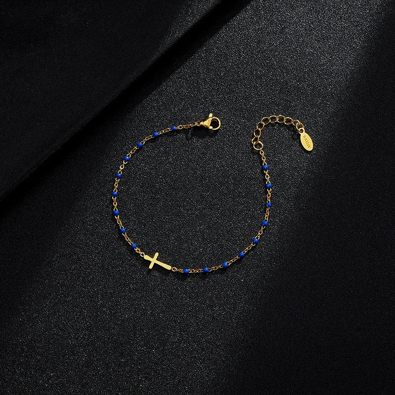 GR | Gold-tone cross bracelet