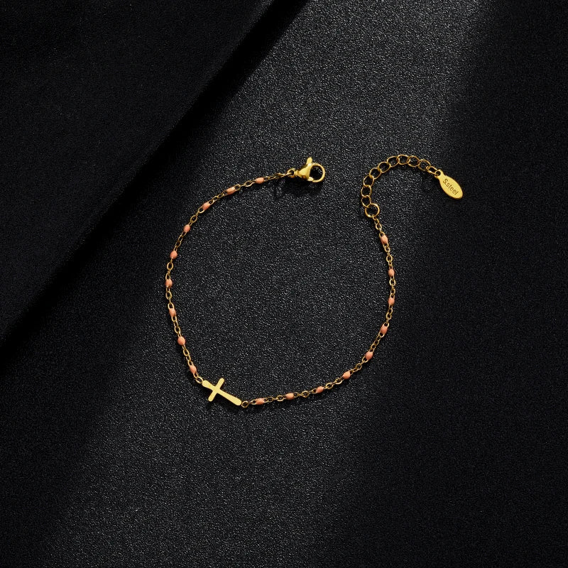 GR | Gold-tone cross bracelet