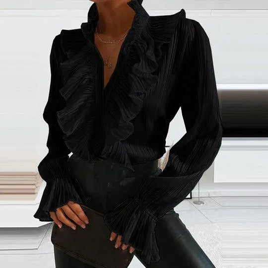 GR | Blouse with ruffles and long sleeves.