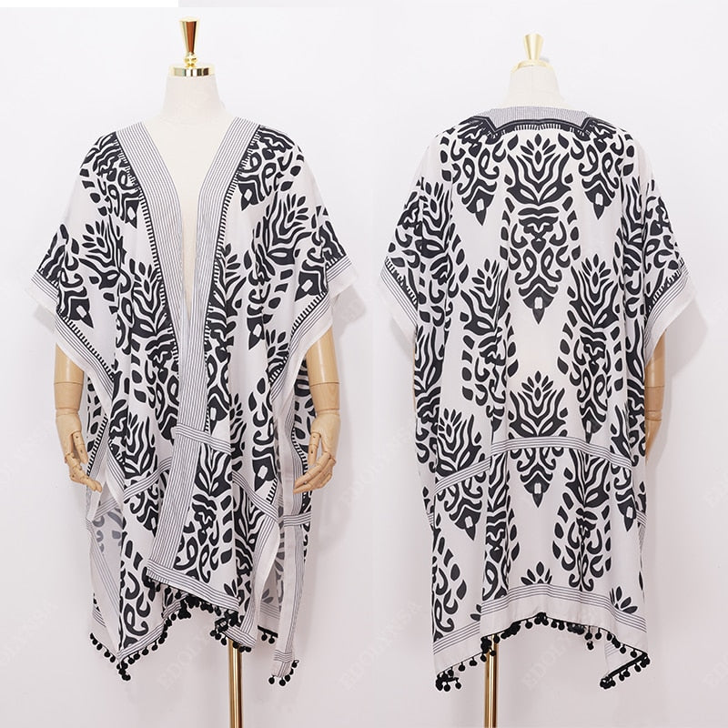GR | Bohemian kimono with leaf print and fringe detail