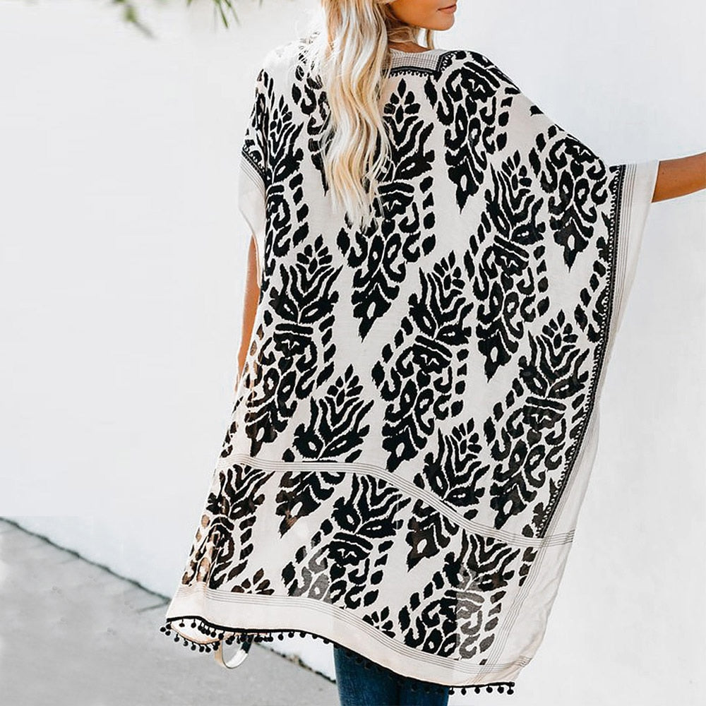 GR | Bohemian kimono with leaf print and fringe detail