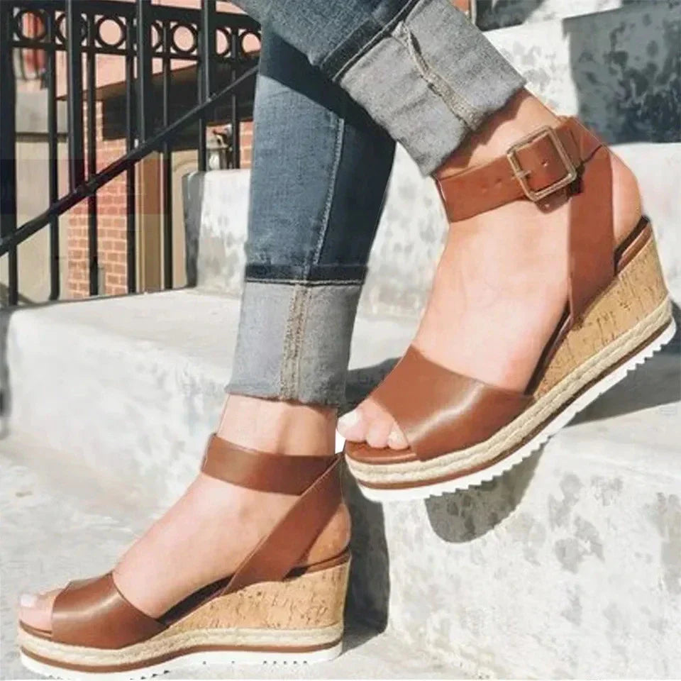 Sandals with buckled wedge heels