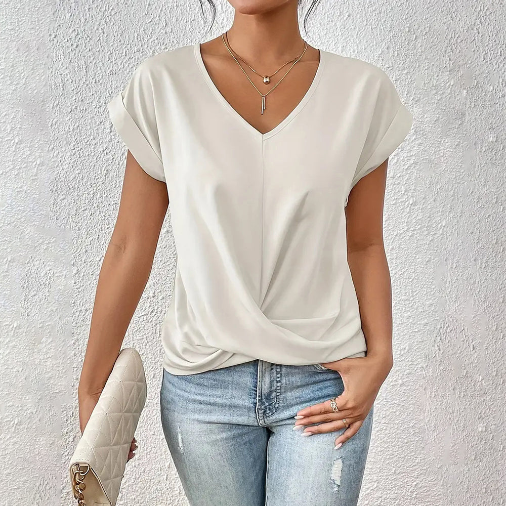 GR | Elegant, solid-color T-shirt with a V-neck and twisted hem for women